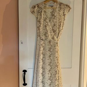 Urban Outfitters Dress. Cream color with floral pattern. Size Small.
